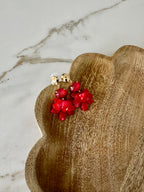 Oorbellen goud met rood en bloem