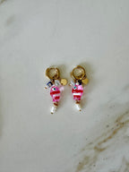 Oorbellen met goud en roze vis