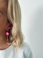 Oorbellen goud met roze bloem