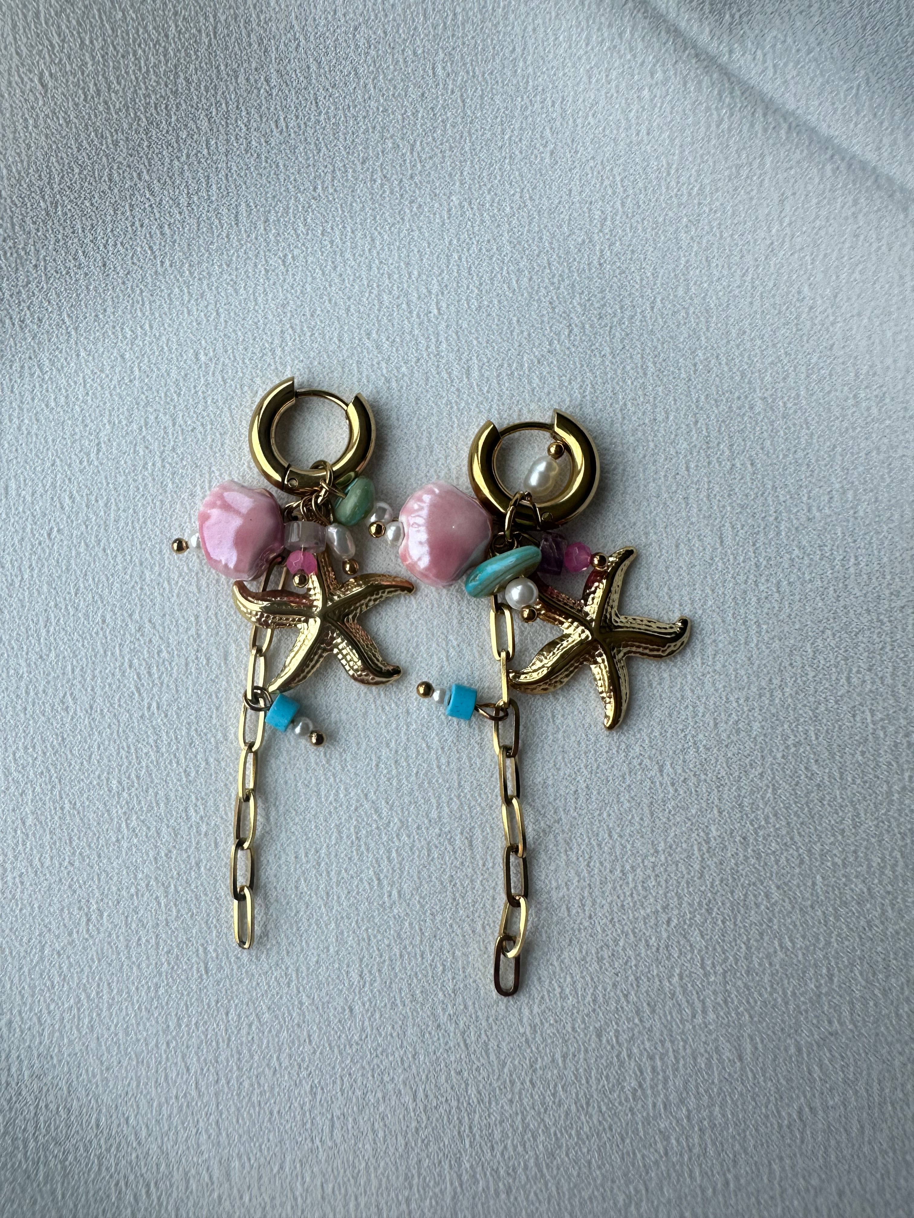 SUMMER SALE -40%! Oorbellen goud met zeester